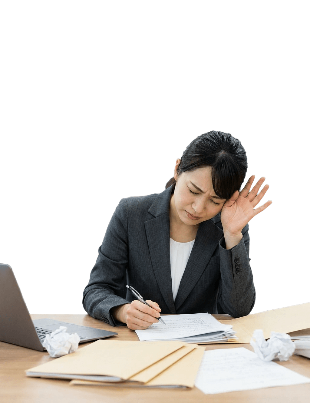 申請書作成に頭を抱えるビジネスパーソン